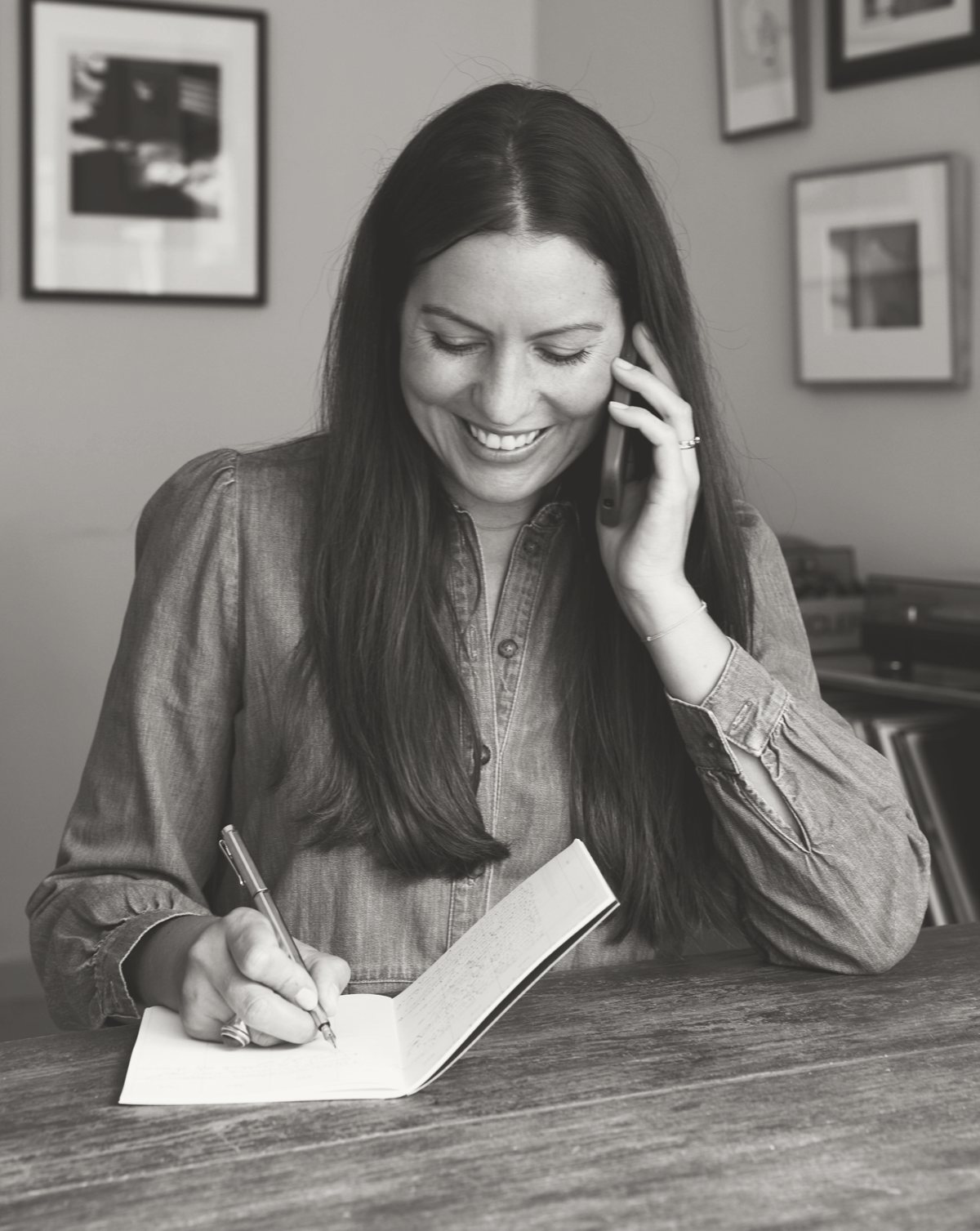 Melanie Schneider taking notes during a call